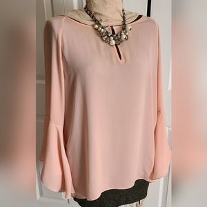 Pretty blouse, necklace not included.